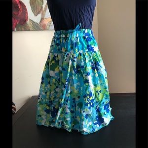 - Super fun teal/yellow splatter pain design skirt